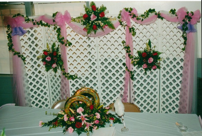  and instead of lattice backdrop soft chiffon draping provides a serene 